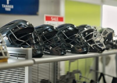 lacrosse helmets on shelf