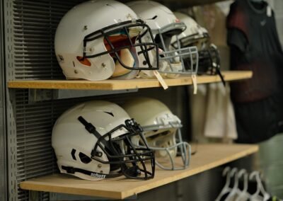 football helmets on shelves